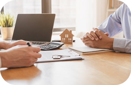 Insurance services Mesa AZ consultation with a client at a desk