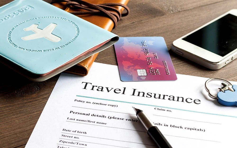 Travel insurance Mesa AZ policy form with a passport and credit card